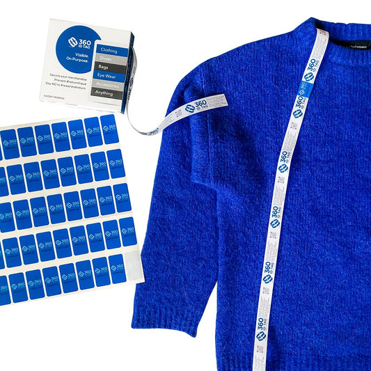 E-commerce return security tag on sweater. Prevent return fraud like wardrobing, wear and return, counterfeit product switches and tag switches. Add return tag to clothing, shoes, accessories to stop fraudulent returns. 360 ID Tag.