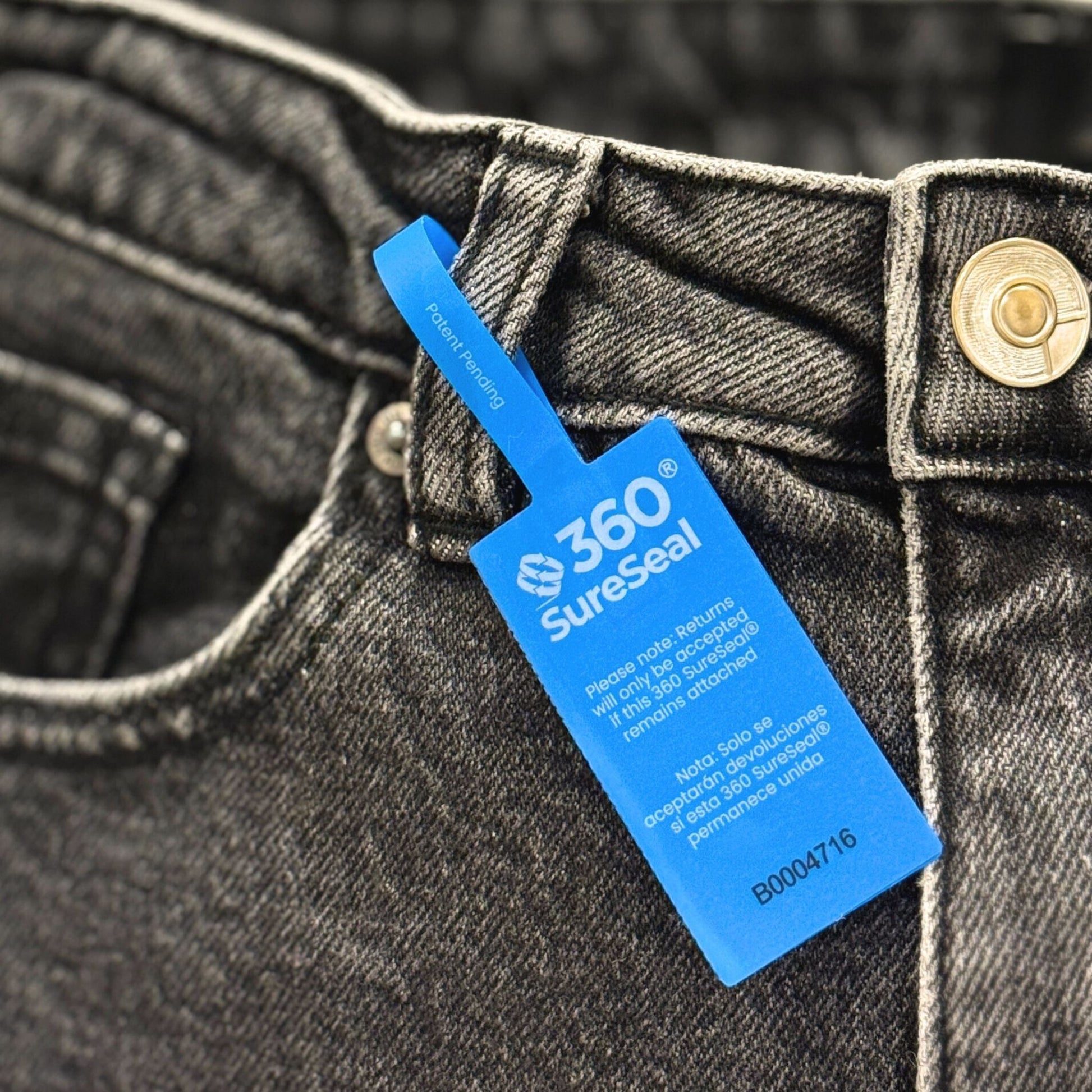 360 SureSeal large attached to denim jeans belt loop tamper-evident return integrity tag prevents wear and return fraud