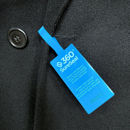 tamper-evident return integrity seal attached to coat buttonhole 360 SureSeal large prevents wear and return fraud