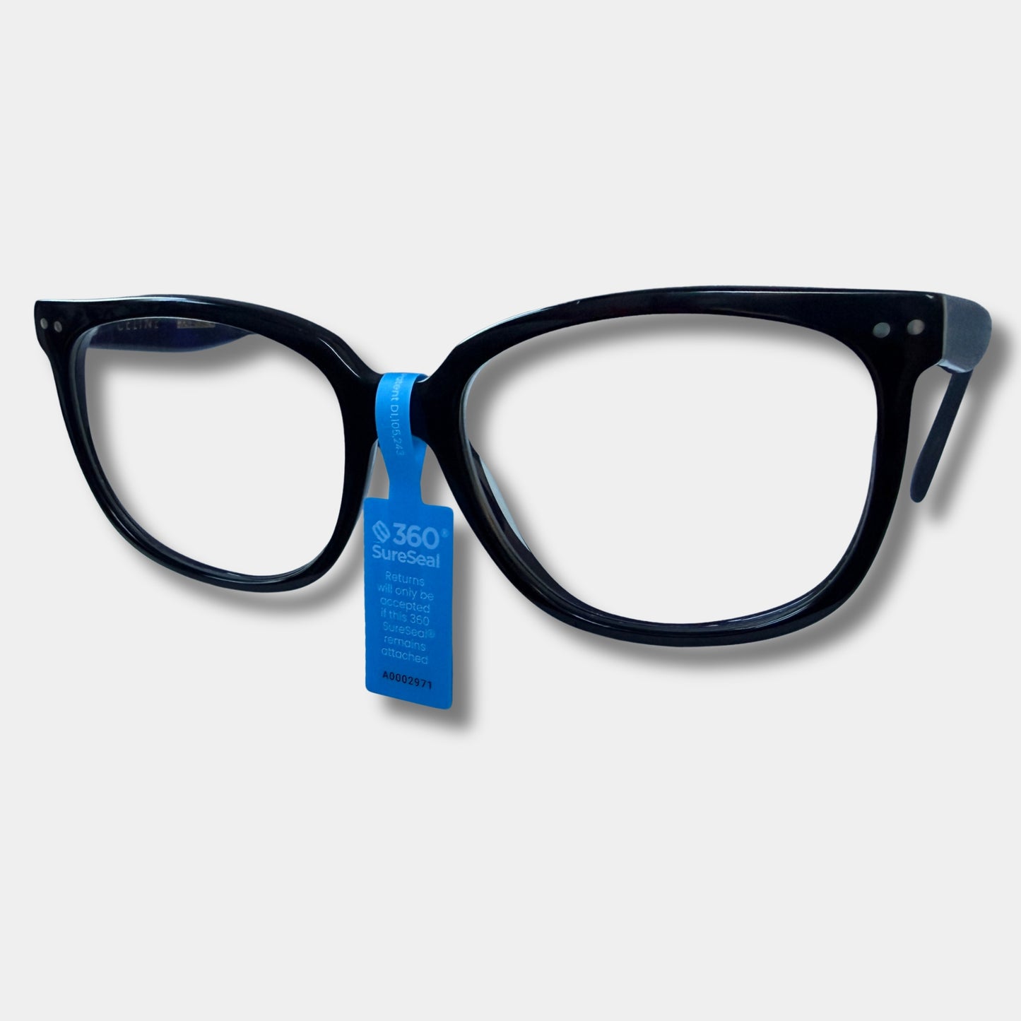 360 SureSeal small tamper-evident tag applied to eyeglasses frame for secure try-on and return fraud prevention