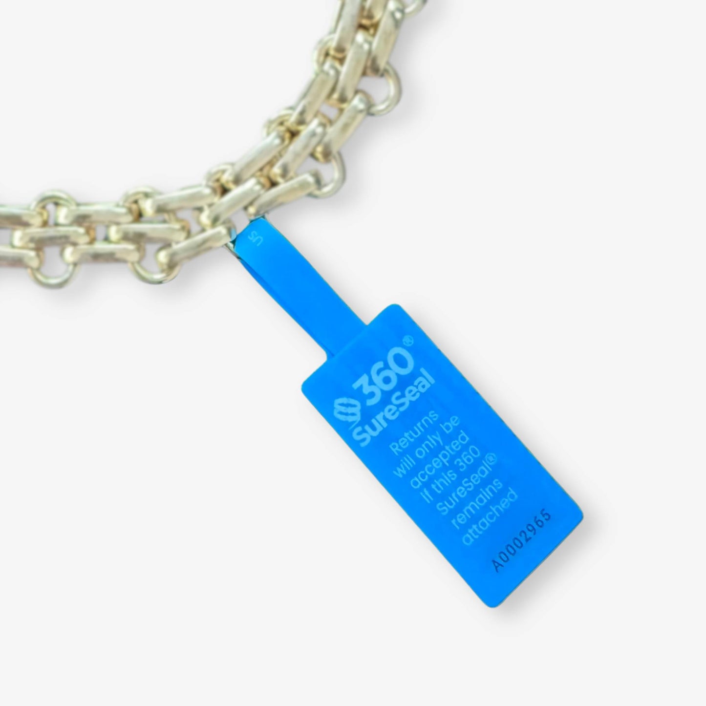 360 SureSeal small tamper-evident return integrity tag attached to jewelry chain for e-commerce return fraud prevention