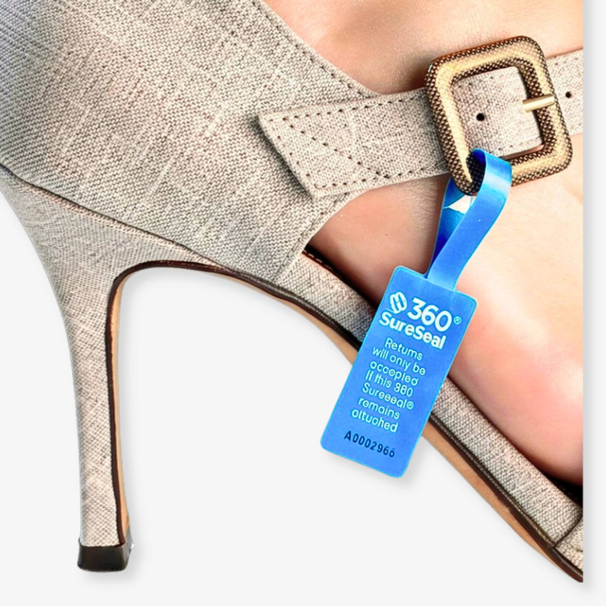 360 SureSeal® Large tamper-evident return integrity tag attached to shoe strap on high heel, preventing wear-and-return fraud