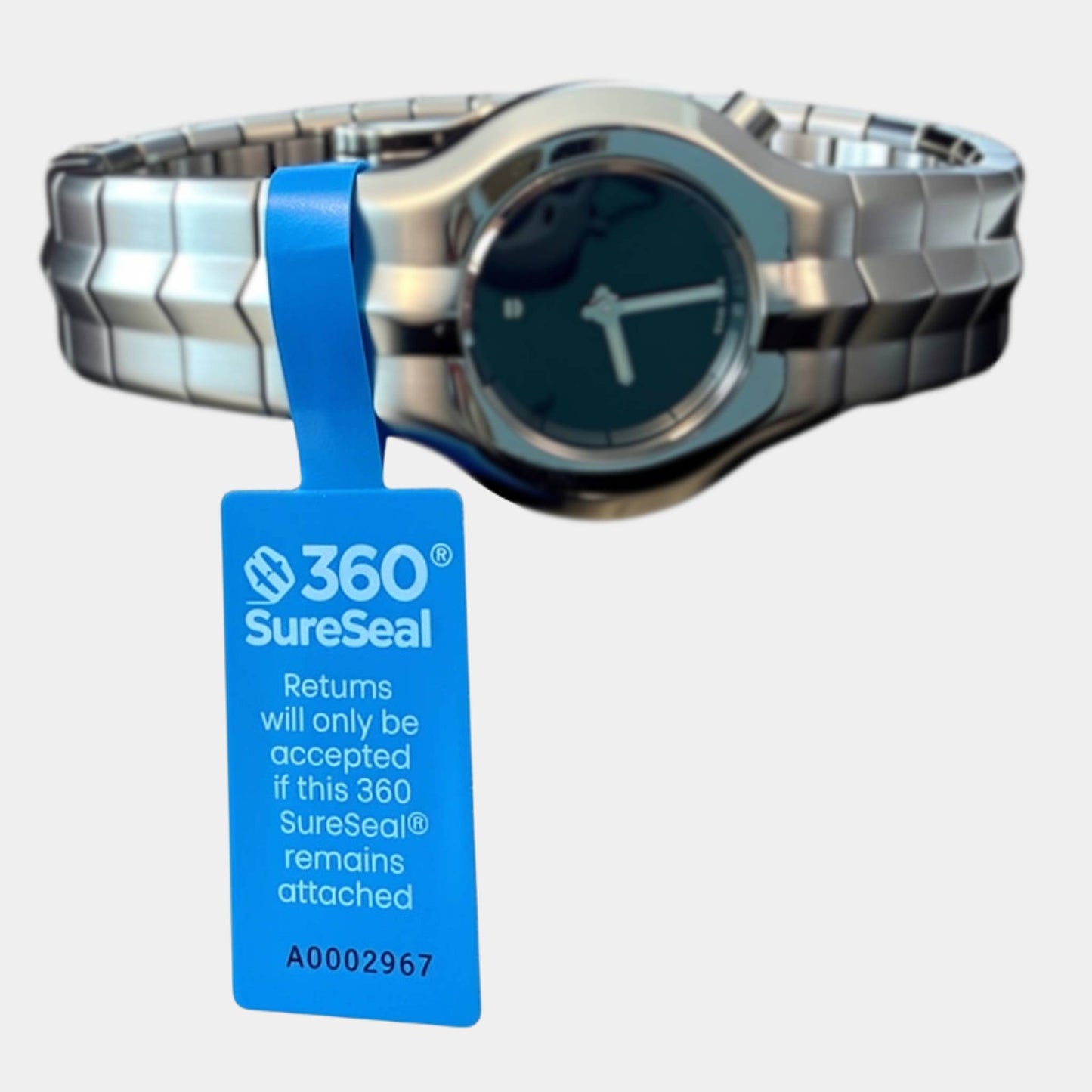 360 SureSeal small security tag applied to watch bracelet for secure try-on and return fraud prevention in accessories