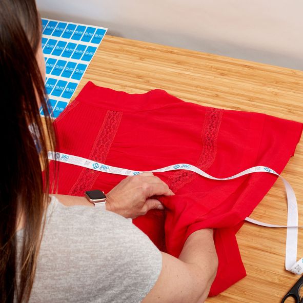 Attaching a 360 ID Tag to a blouse to stop e-commerce return fraud
